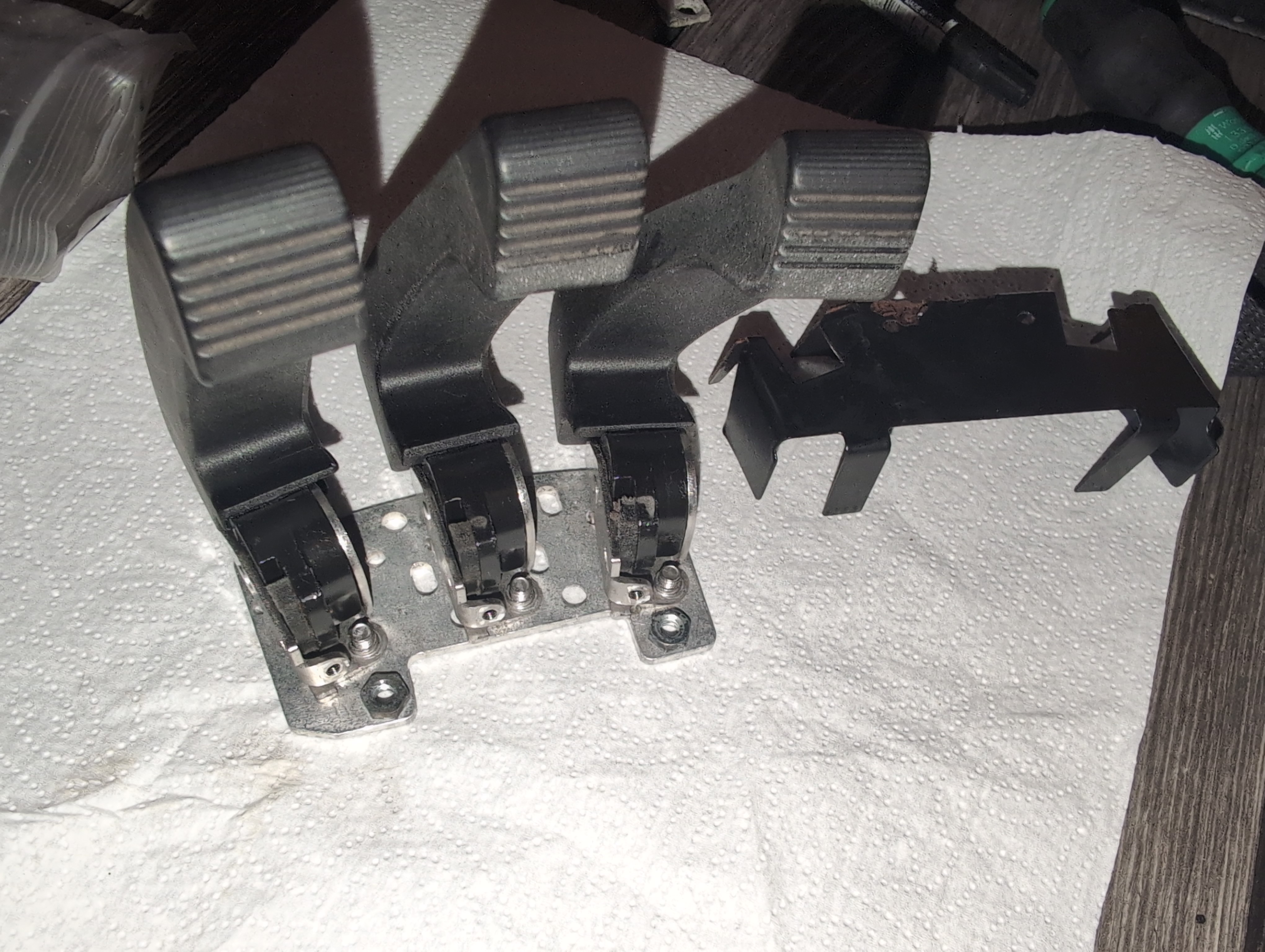 Disassembled Jungheinrich multiPILOT parts metal bracket plastic rocker lever M Nr 51206812